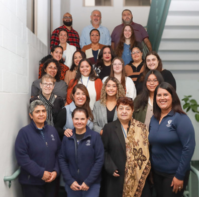 Photo of UCC Care Management Team posing for the camera on the stairs